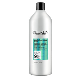 Bottiglia di Shampoo Redken Grigia Capelli Ricci 